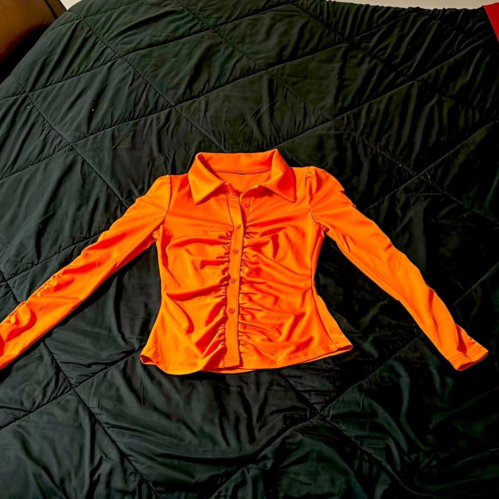 Women’s orange blouse